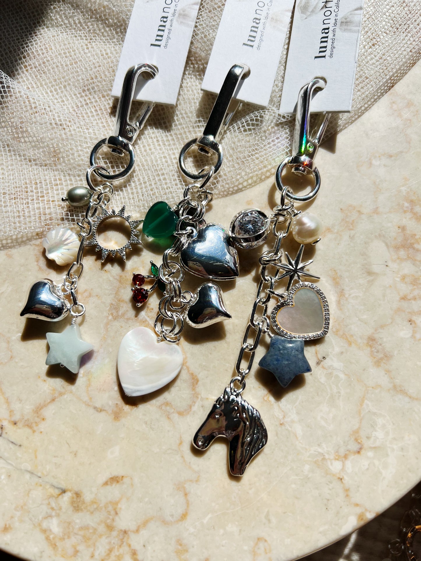 Mystery Plukk Veske-charm – Sølv