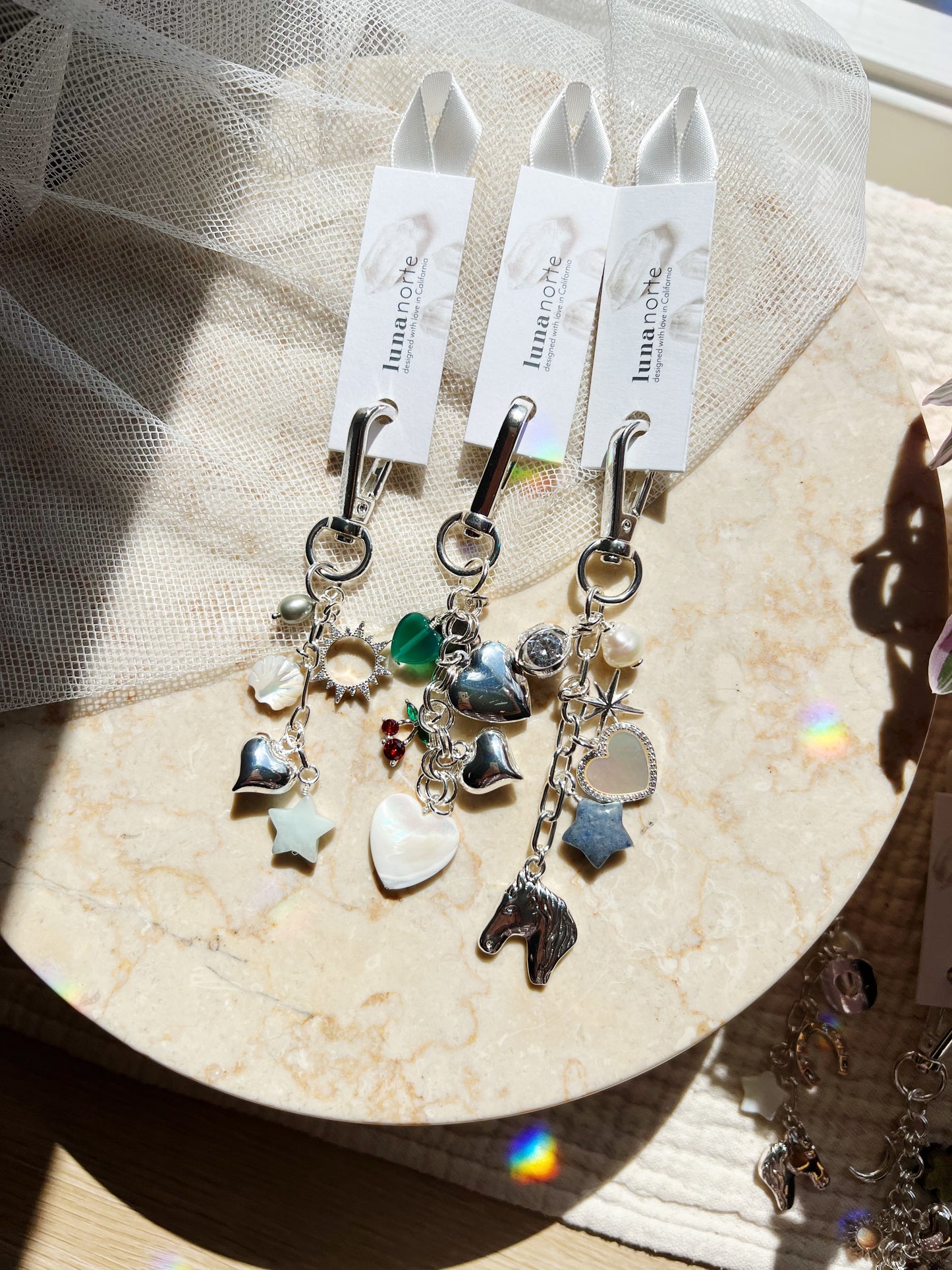 Mystery Plukk Veske-charm – Sølv